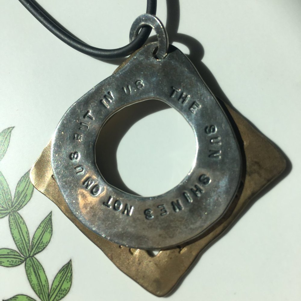 Unique and inspirational necklace from Nomi 2007.